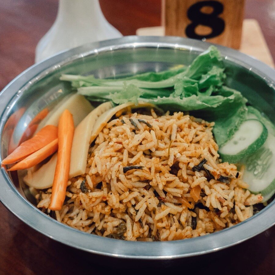 Burmese fried rice served with fresh vegetables